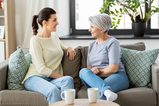 Senior woman talking to her adult daughter