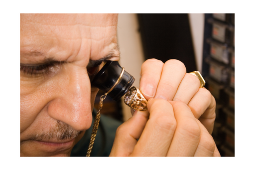 Appraiser examining a ring