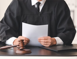A judge holding documents