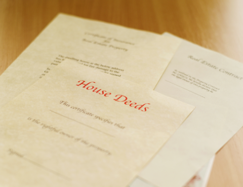 House deeds and real estate contract documents.
