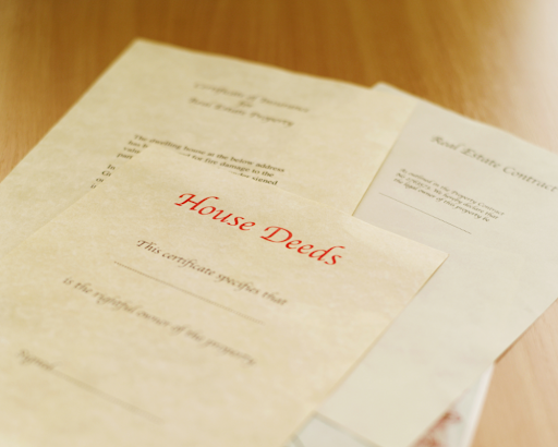 House deeds and real estate contract documents.