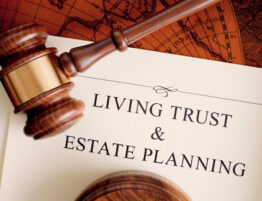 Living Trust & Estate Planning document with a wooden gavel.